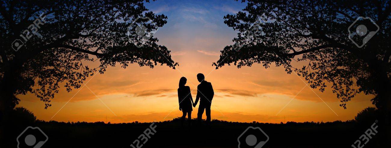 10532785-la-imagen-de-dos-personas-románticas-en-el-amor-de-pie-en-la-puesta-de-sol.jpg