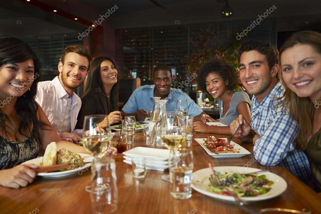 depositphotos_50473983-stock-photo-group-of-friends-enjoying-meal.jpg