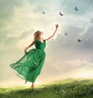 34683160-mujer-hermosa-en-un-vestido-verde-cazando-mariposas-en-una-montaña.jpg