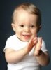 11401565-a-young-boy-clapping-his-hands.jpg